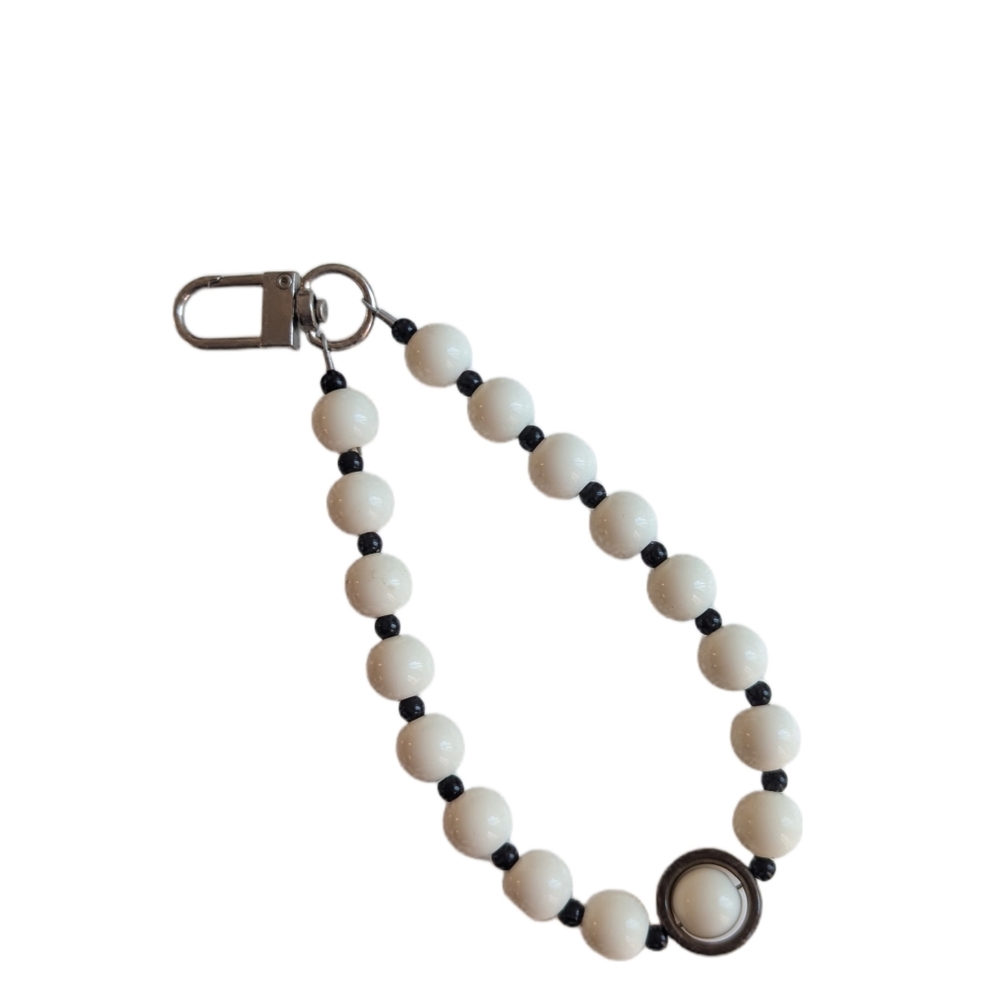 White and Black Beaded bracelet with a clasp